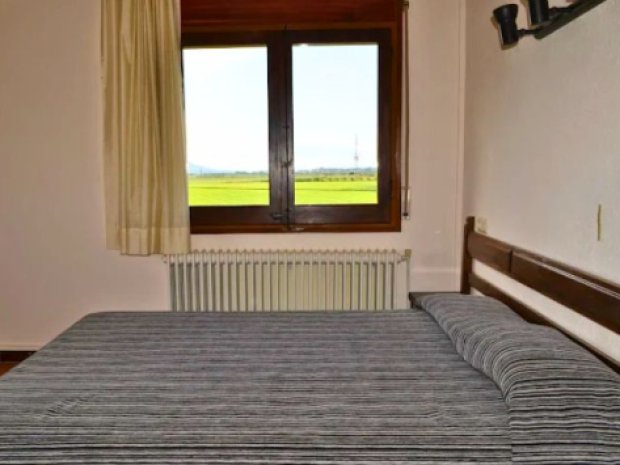 Couchage en lit à l'hébergement de l'Esplai 